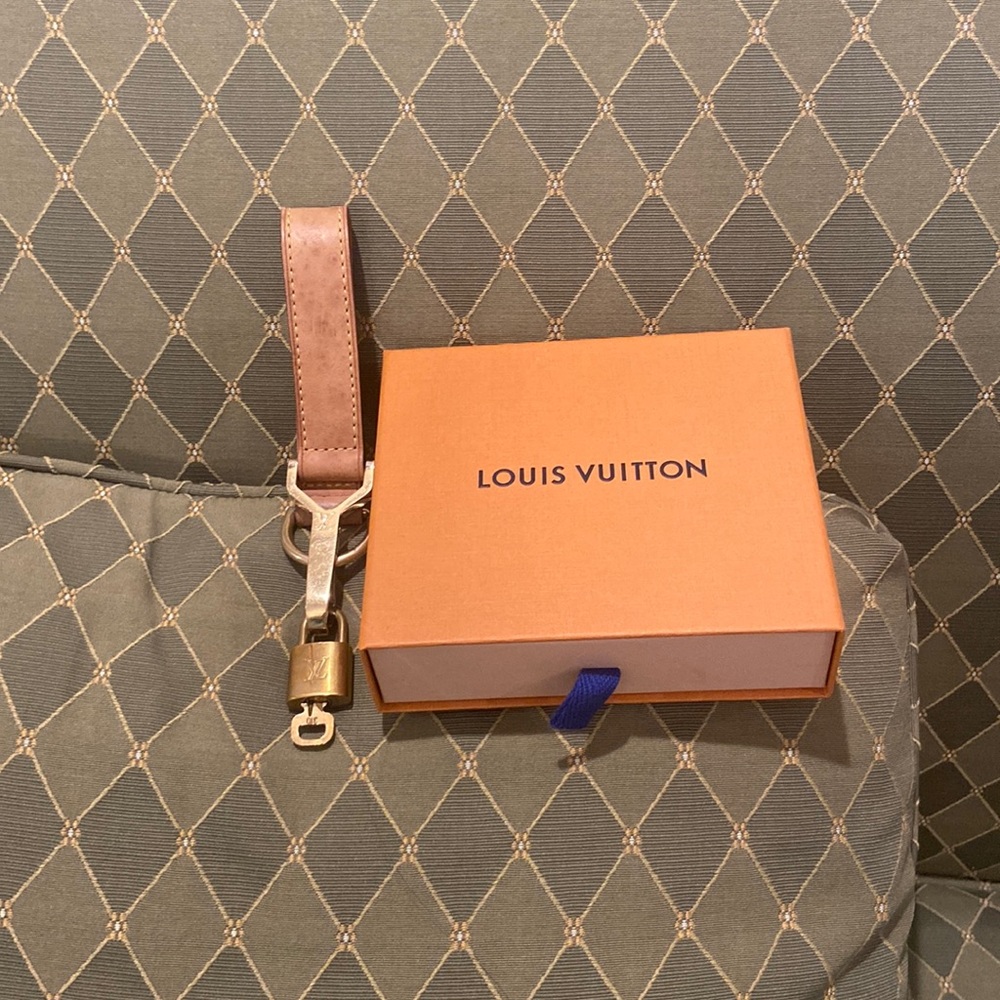 Authentic Louis Vuitton key chain with lock and key and box